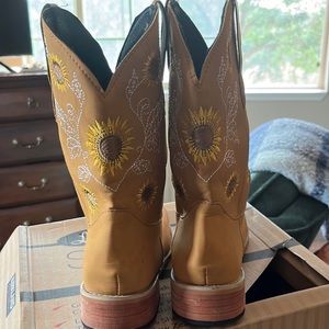 Sunflower embroidered cowgirl boots. Brand new. Never worn.